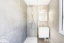 Grande douche à receveur plat