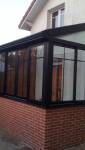 Réalisation finale d'une véranda de l'agence La Maison Des Travaux Carvin à Courrières.