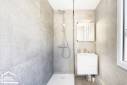 Grande douche à receveur plat