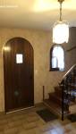 Rénovation d’une entrée avec escalier et éléments bois à proximité de Sautron avant