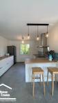 Transformation d'une cuisine moderne et lumineuse après travaux à Arzo