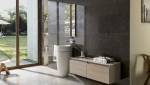 sol en marbre clair et mur en marbre foncé - Porcelanosa