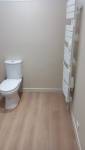 Création d'un WC dans la salle de bain à l'étage de l'espace nuit 