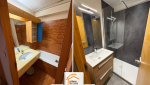  parquet PVC appartement montagne, crédence cuisine moderne, rénovation logement station ski, rénovation intérieure Savoie, artisan rénovation Méribel