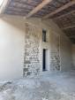 Façade en pierre apparente rénovée - Alixan 26300
