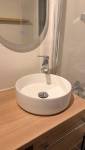 Détails des finitions après rénovation complète de la salle de bain à paris 