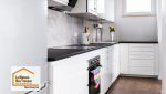 Rénovation complète de cuisine au Mas-d’Agenais (47430) avec installation de meubles modernes, plan de travail et optimisation de l’espace par un courtier en travaux à Agen.