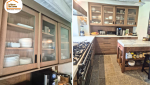 travaux cuisine Pays de Gex, création cuisine sur mesure, cuisine bois authentique, rénovation maison Divonne-les-Bains, projet cuisine