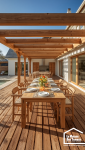 Grande terrasse en bois exotique aménagée pour un déjeuner en famille au printemps en Bretagne.