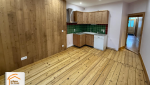 rénovation parquet Beaufort, parquet bois massif rénovation, rénovation intérieure Savoie, restauration parquet ancien, rénovation logement Savoie, courtier en travaux