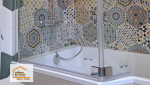 Rénovation de salle de bain entre Agen et Boé avec douche moderne, paroi vitrée et carrelage décoratif aux motifs géométriques pour une ambiance élégante et chaleureuse.