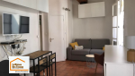 Rénovation énergétique d’un studio dans le centre historique d’Aix-en-Provence avec optimisation des volumes, amélioration du confort thermique et modernisation de la pièce de vie par La Maison Des Travaux Aix-en-Provence.