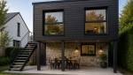 Extension bois sur pilotis avec bardage bois foncé 69290 Grézieu-la-Varenne