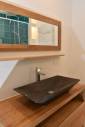 Meuble vasque en chêne massif et vasque en pierre, salle de bain Paris 17
