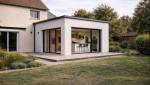 Extension maison toit plat enduit blanc à Francheville 69340