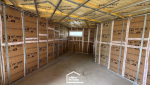 Chantier d’agrandissement de maison en cours : isolation, cloisons et préparation des volumes intérieurs.
