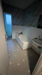Salle de bain sinistrée avant travaux