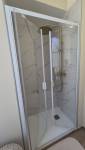 Douche avec corps encastré