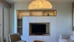 Meuble TV design avec niches décoratives réalisé à Écully (69130)
