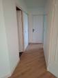 Rénovation de couloir de maison avec peinture et parquet - Chalamont 01320
