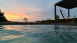 piscine béton sur mesure Serbannes coucher de soleil