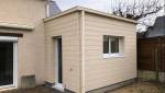 Extension maison bardage composite beige à Francheville 69340