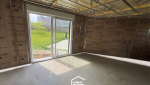 Extension de maison à Lanloup : création d’un nouvel espace lumineux pour une suite parentale avec chambre, dressing et salle de bain.