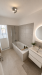  Salle de bain rénovée avec suggestion d'aménagement