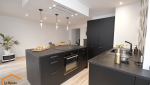 Cuisine noire avec îlot central dans un appartement rénové à Voiron