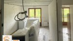  rénovation appartement Praz-sur-Arly, rénovation cuisine Praz-sur-Arly, appartement montagne chaleureux, rénovation intérieure Haute-Savoie, la maison des travaux chamonix