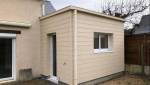 Extension maison bardage composite beige à Francheville 69340