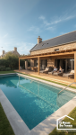 Piscine béton sur mesure intégrée à un aménagement extérieur 