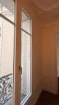 Fenêtre et cimaises, appartement haussmannien Wagram