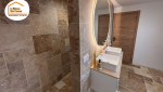  aménagement salle de bains Gex, optimisation espace salle de bain, travaux salle de bains Pays de Gex, salle de bain lumineuse moderne, rénovation maison Gex