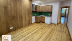 rénovation parquet Haute-Savoie, parquet bois ancien rénové, ponçage parquet appartement, rénovation intérieure montagne, la maison des travaux sallanches, la maison des travaux chamonix
