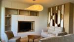 Meuble TV sur mesure réalisé lors d'une rénovation d'intérieur à Écully (69130)