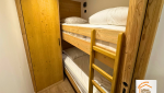 cuisine ouverte appartement, création suite parentale, deux salles de bains appartement, rangement sur mesure chambre, décoration montagnarde contemporaine