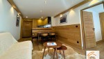 rénovation salle de bains Méribel, douche à l’italienne appartement, suite parentale montagne, meuble vasque sur mesure, machine à laver intégrée