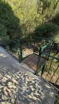 accès escaliers du balcon vers le jardin La Maison Des Travaux Ales