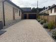 Extension de maison avec bardage en bois à Merville-Franceville