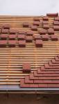 Restauration de toiture, pose de tuiles plates