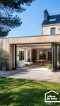 Extension en ossature bois à toit plat sur une maison à Vannes