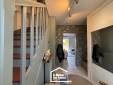 Entrée fonctionnelle et chaleureuse aménagée dans une maison à Damgan
