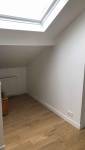 Optimisation de l'espace pour un bureau sous les combles d'une maison en région parisienne