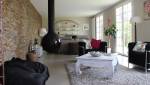 Salon rénové avec cheminée design