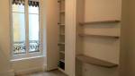 Rénovation et réagencement d'un appartement situé dans le quartier Lyon Brotteaux : chambre et rangements sur mesure