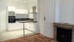 Rénovation et réagencement d'un appartement situé dans le quartier Lyon Brotteaux : vue sur la cuisine