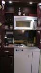 Cuisine pour studio, intégrée dans un placard