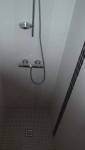 Installation d'une douche moderne dans le Calvados