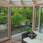 Construction d'une véranda bois avec parois en verre - Bourg-en-Bresse 01